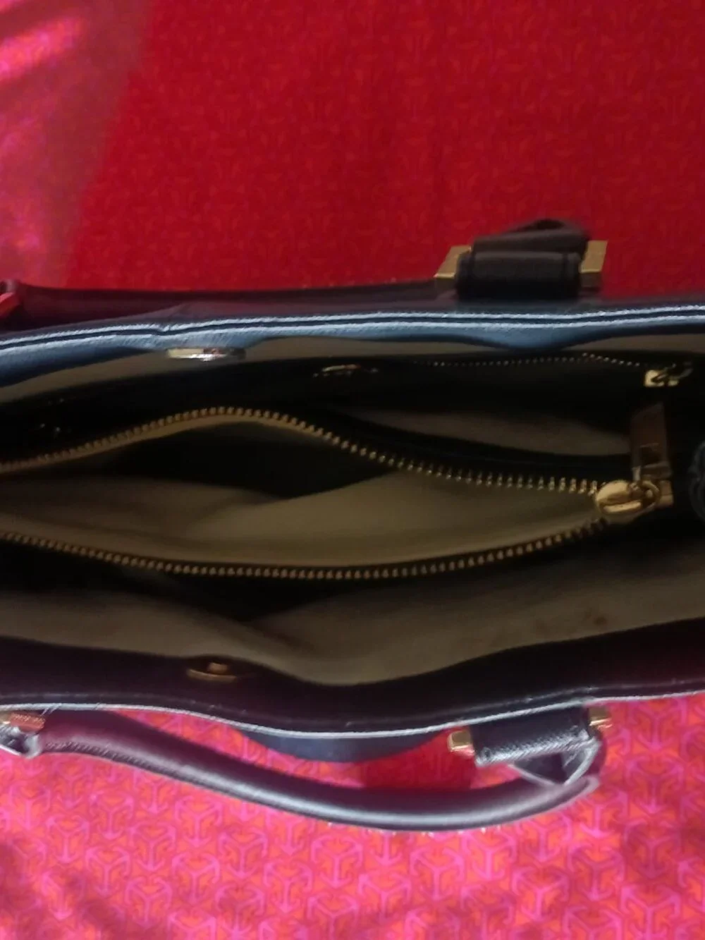 Tory Burch Black top handle bag. upgrade your workday style with this purse.